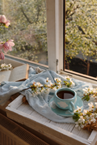 Spring seasonal living tea by window reconnecting with nature and seasonal living